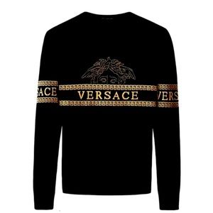 New with tags Versace top, black and it’s a Large